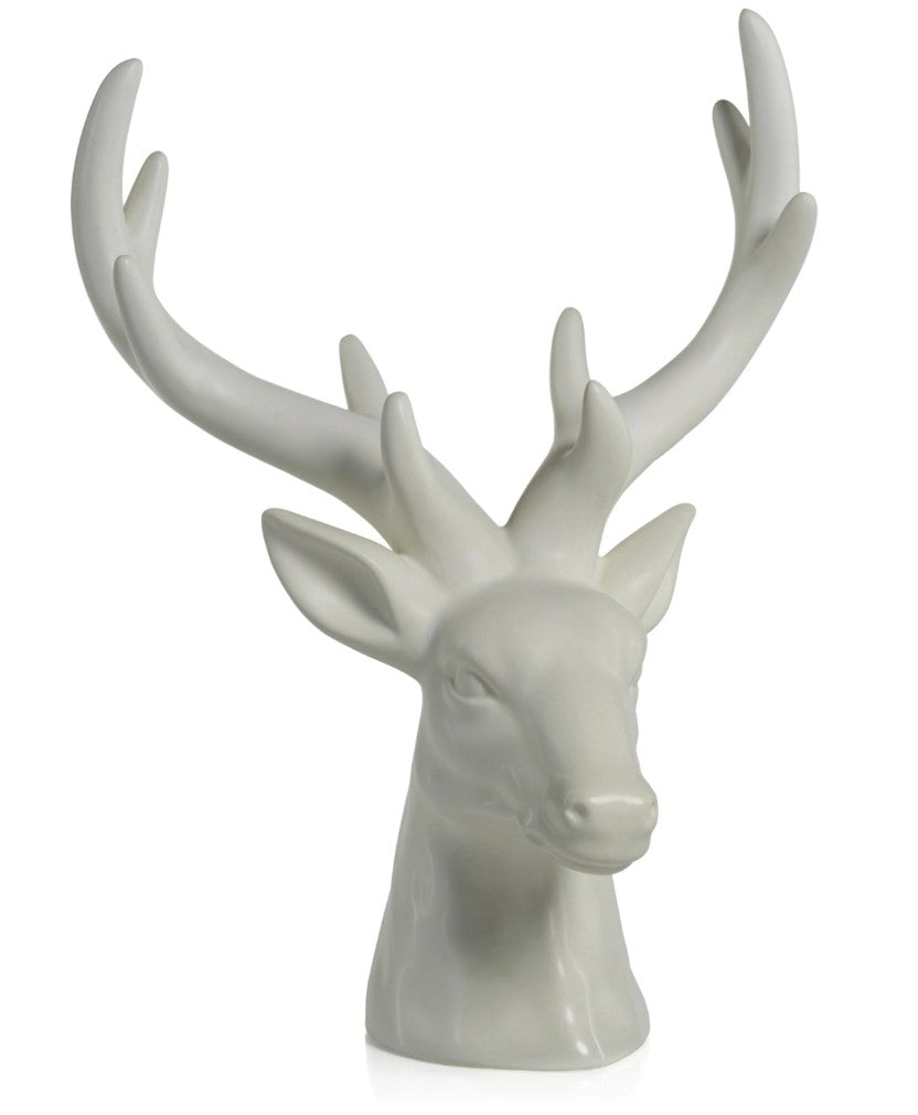 White deer head sculpture on a white background